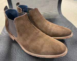 The finished brown suede boots