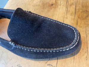 Finished blue suede shoe