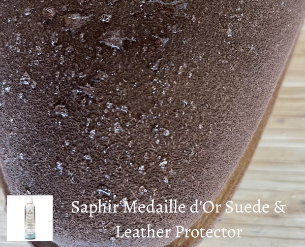 Water being repelled by Saphir suede protector product