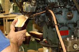 Shoes being stitched
