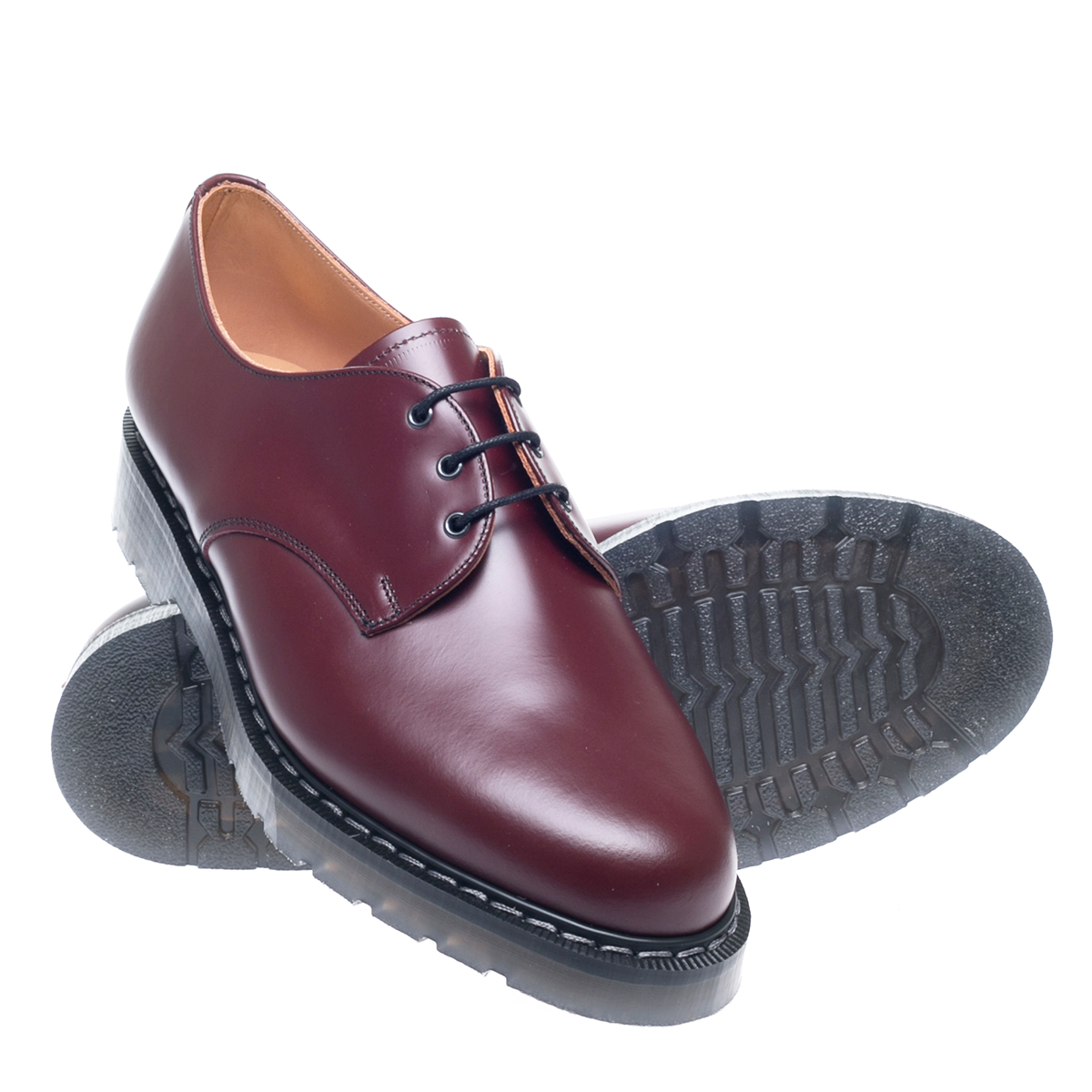 oxblood polish on brown shoes
